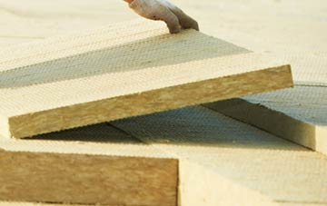 measuring Camel Green tapered insulation